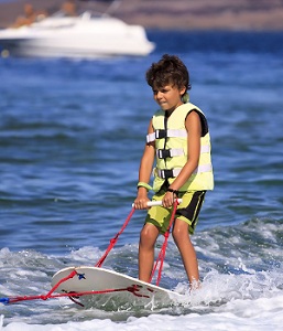 Child ski boarding in the Algarve