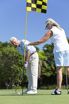 Couple on Algarve golf course Portugal