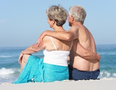 Couple sitting on the beach