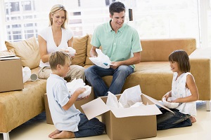 Family preparing to pack for Portugal